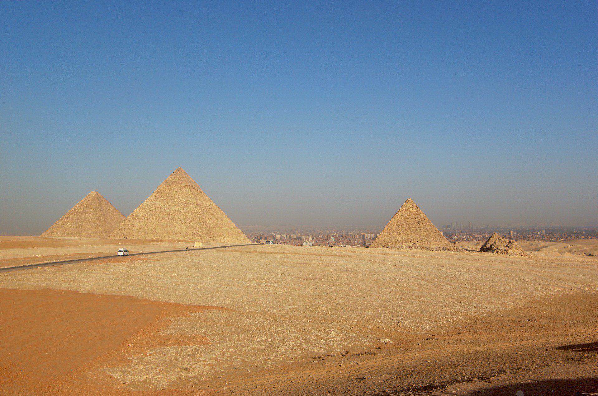 Egyptian landscape in warm folio light across desert and stone